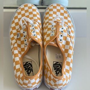 Gold colored checkered men’s U.S 9.5 sized Vans Shoes